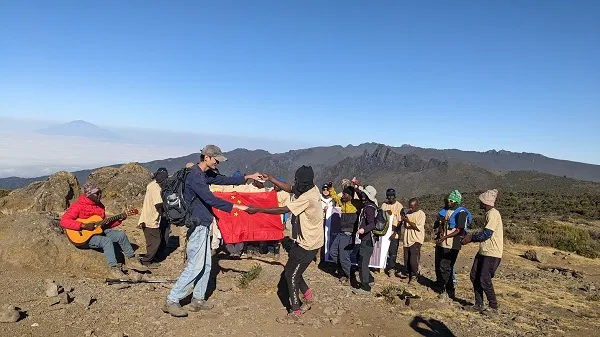 Kilimanjaro summit approach — final ascent toward Uhuru Peak at dawn