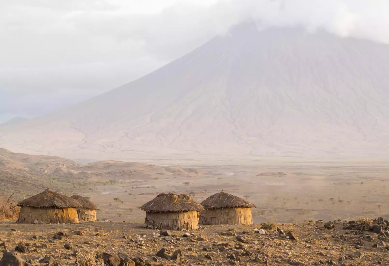 Volcanic landscape near Ol Doinyo Lengai with Lake Natron visible in the distance, Tanzania
