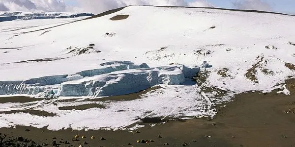 Climbers approaching Uhuru Peak before dawn